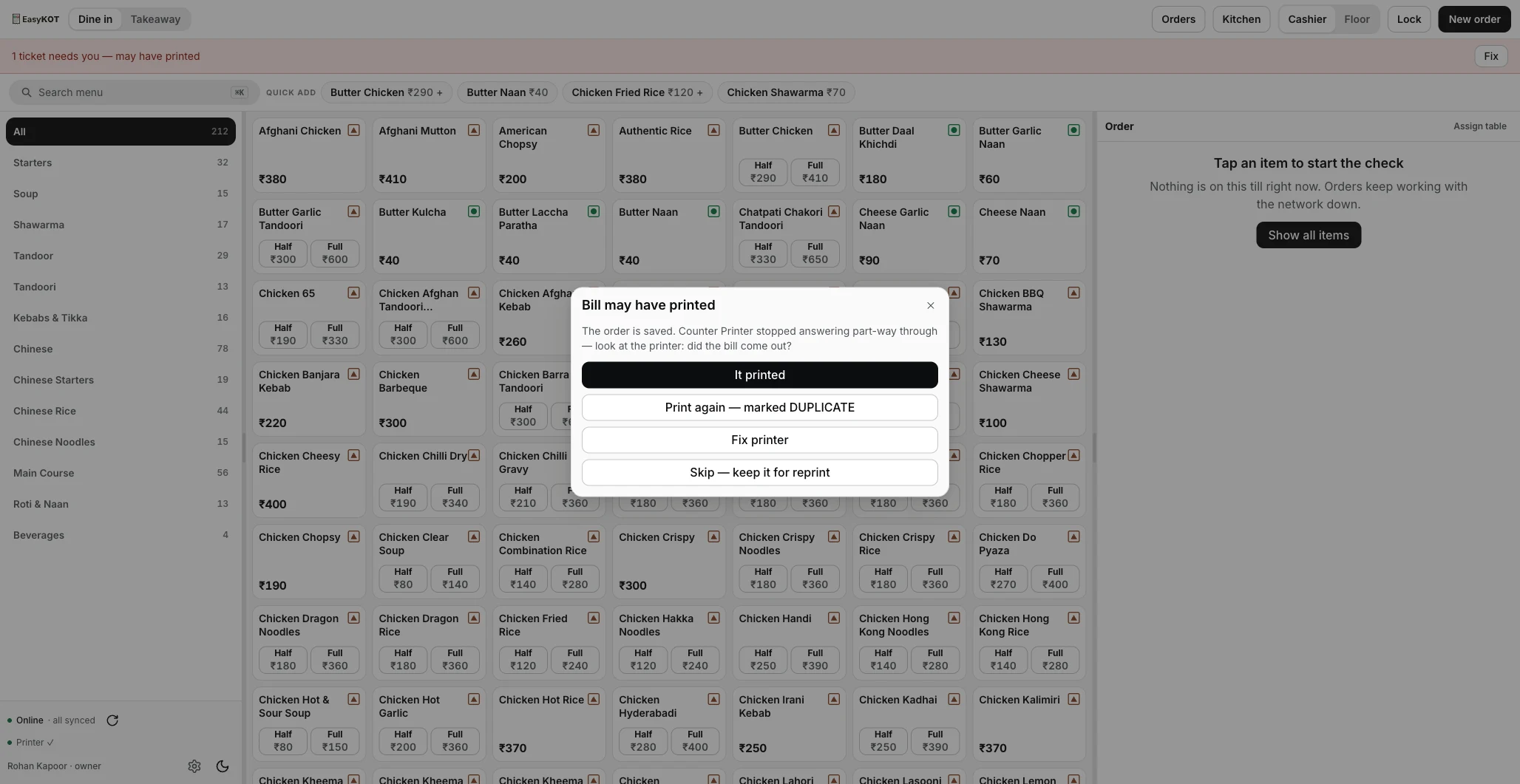 A dialog titled 'Bill may have printed — The order is saved. Counter Printer stopped answering part-way through — look at the printer: did the bill come out?' with four buttons: It printed, Print again — marked DUPLICATE, Fix printer, and Skip — keep it for reprint, over a catalog with a red '1 ticket needs you — may have printed' bar.