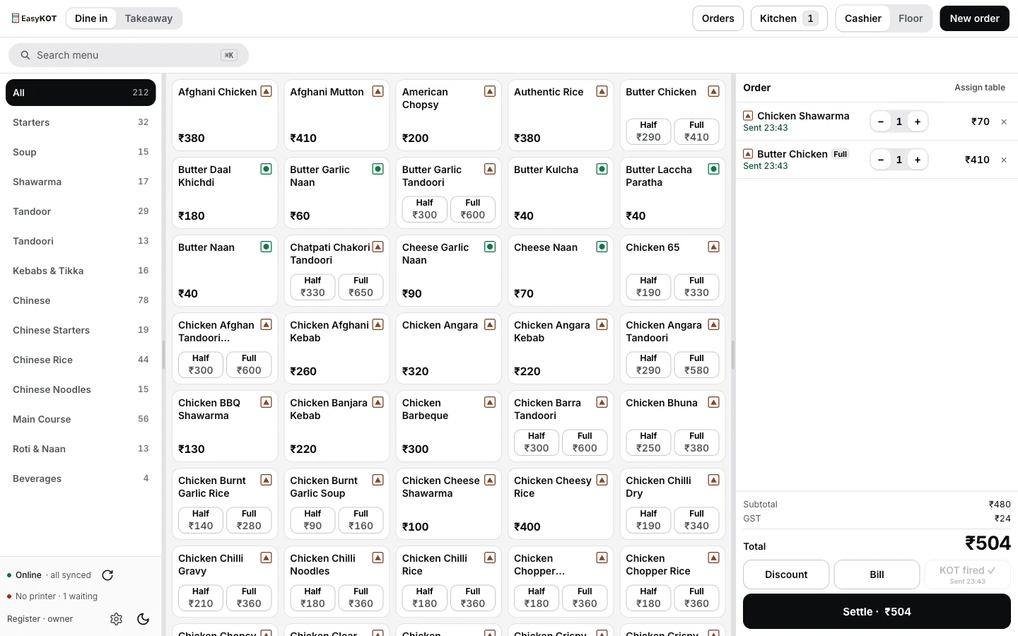 EasyKOT register order panel just after firing a round: Chicken Shawarma and Butter Chicken (Full) both marked Sent 23:43, with Discount, Bill and a disabled KOT fired · Sent 23:43 pill in place of Fire KOT